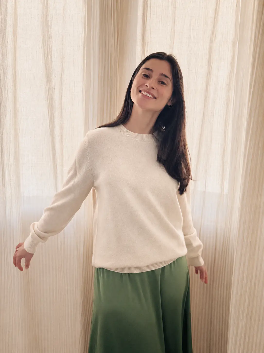 Model wearing Himkash Handcrafted Pure Cashmere Cream Sweater
