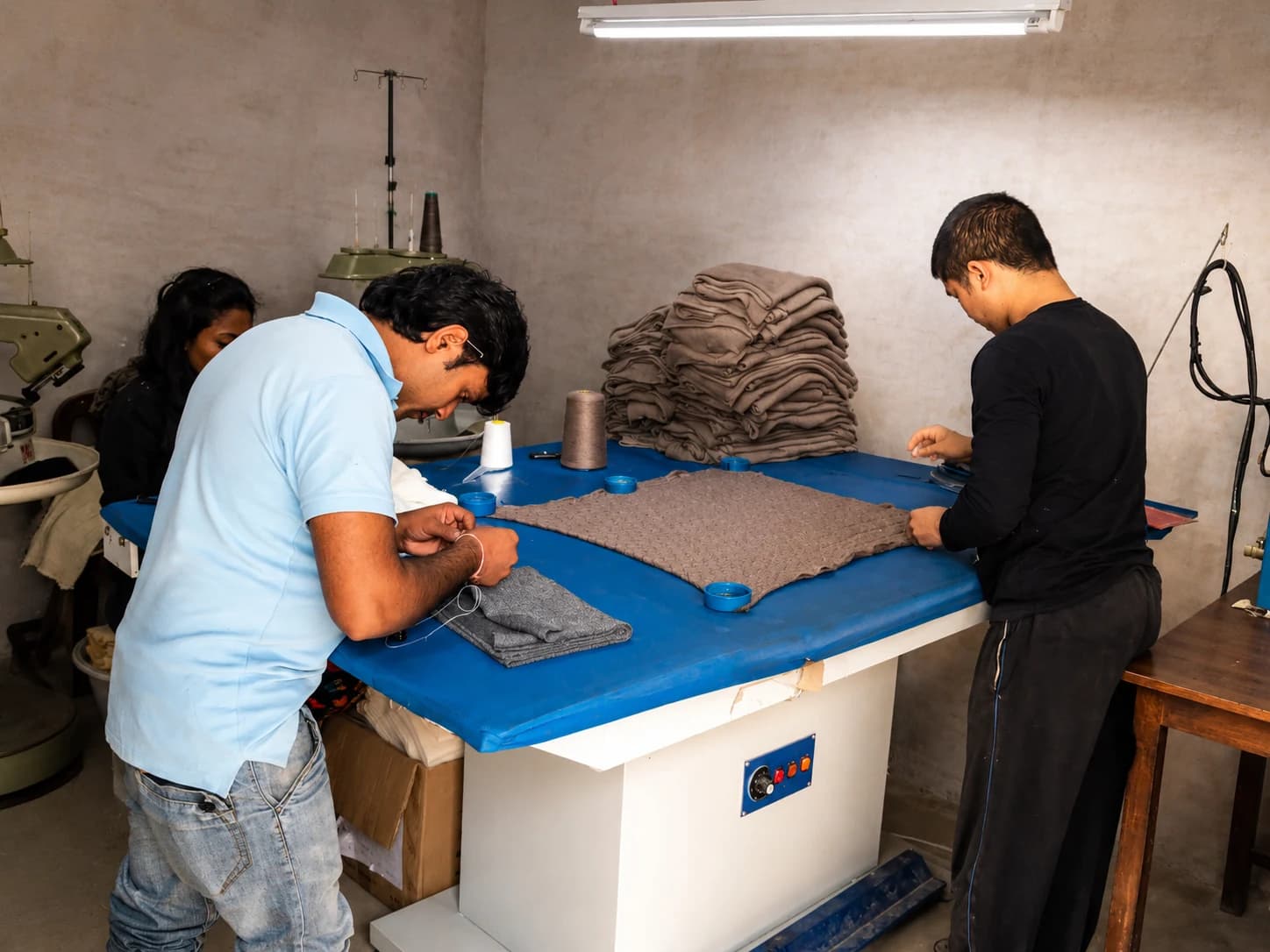 Himkash garment finishing workshop in Nepal — hand-finished details